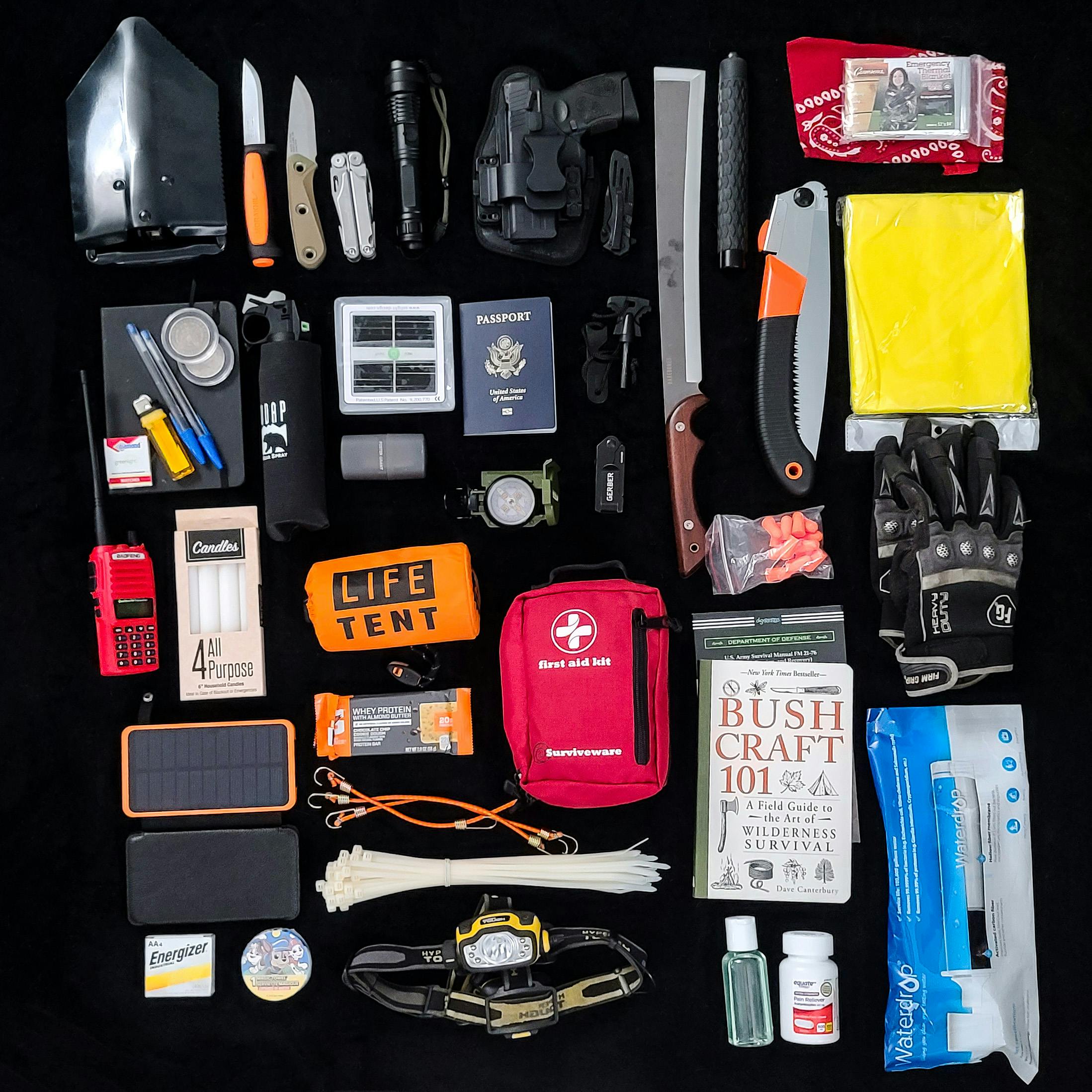 Assorted survival gear kit for outdoor adventures featuring tactical tools and essential equipment for preparedness in rugged environments.